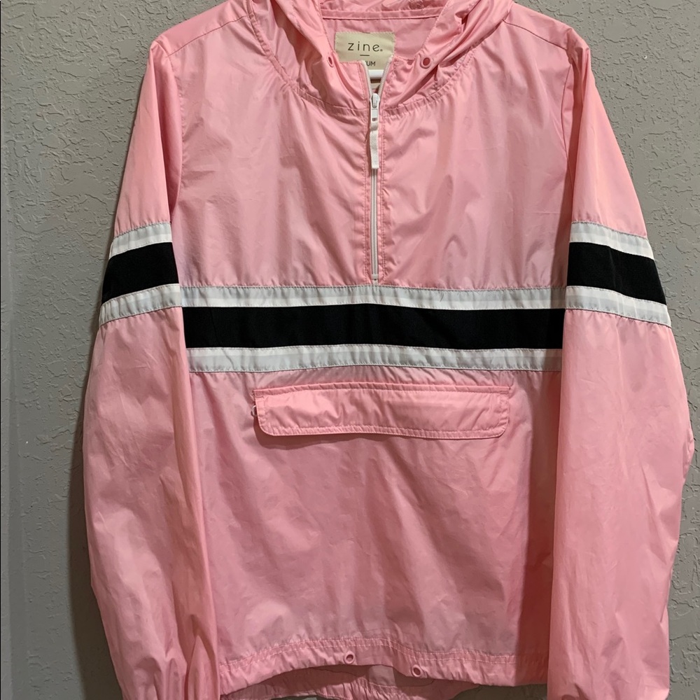 Pink, white, and black windbreaker from Zumiez.